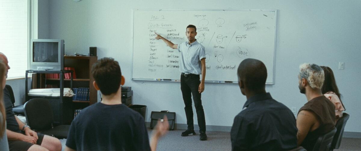 Deaf actor Jeremy Lee Stone plays an instructor in a scene from "Sound of Metal."