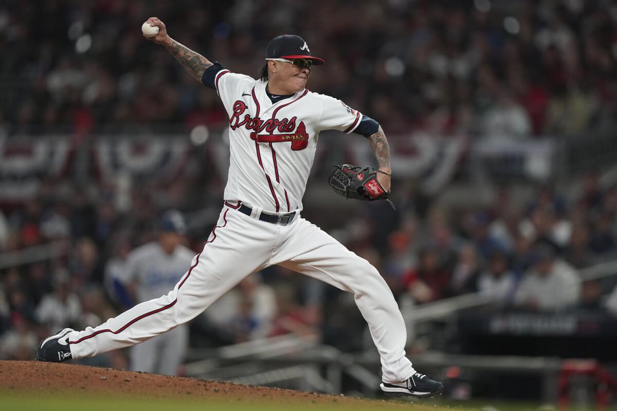 Atlanta Braves relief pitcher Jesse Chavez throws during the third inning.