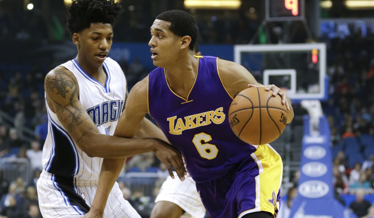 Lakers point guard Jordan Clarkson drives past Magic guard Elfrid Payton during a game Feb. 6 in Orlando. Payton was fourth and Clarkson seventh in voting for this season's NBA rookie of the year award.