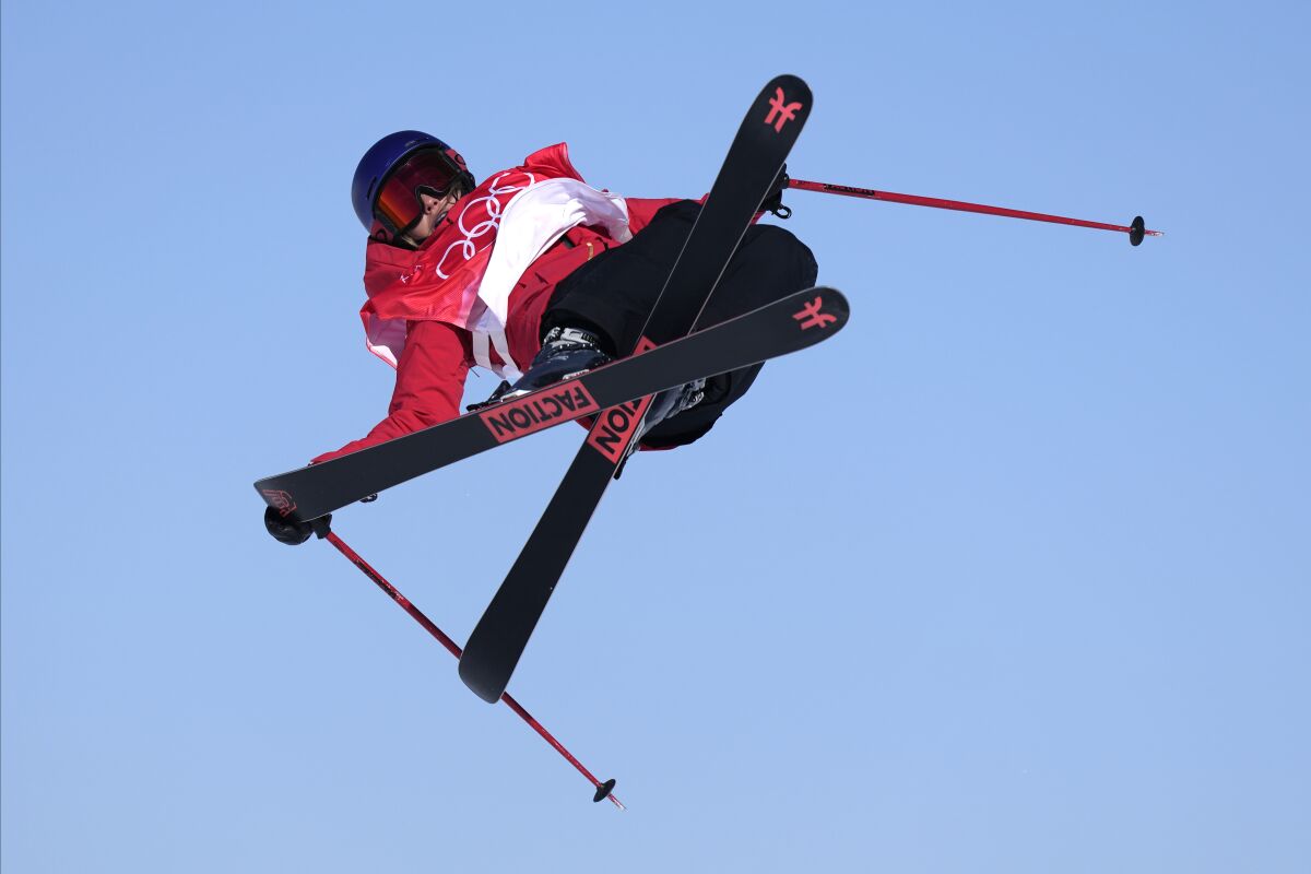 China's Eileen Gu competes during the women's slopestyle qualification at the 2022 Winter Olympics, Monday, Feb. 14, 2022, in Zhangjiakou, China. (AP Photo/Lee Jin-man)