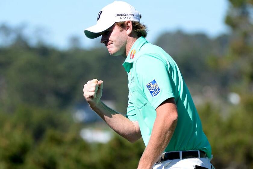 Brandt Snedeker reacts after sinking a birdie putt at No. 5 during the final round of the AT&T Pebble Beach National Pro-Am on Sunday.