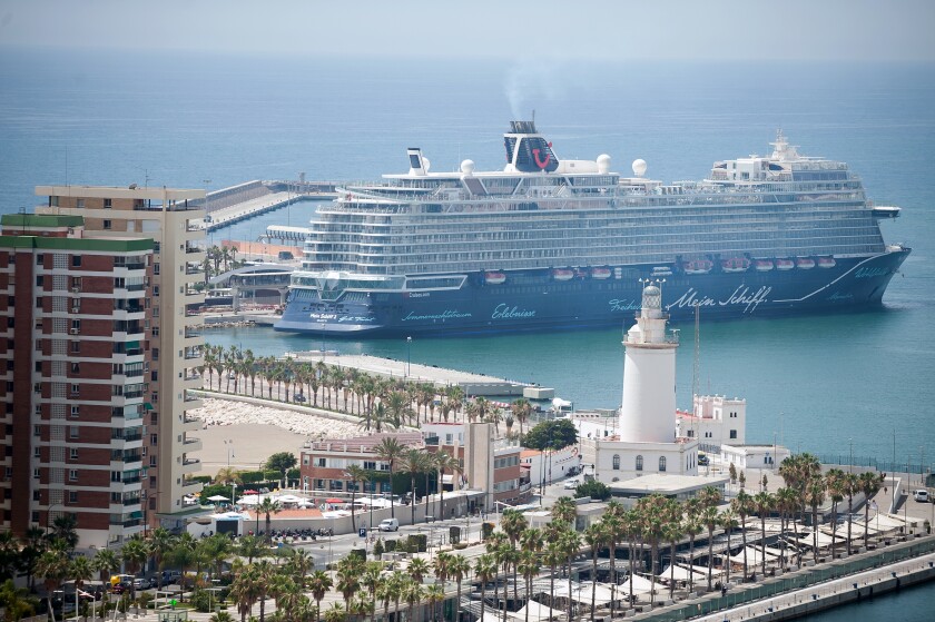 A cruise ship is docked at Malaga Port