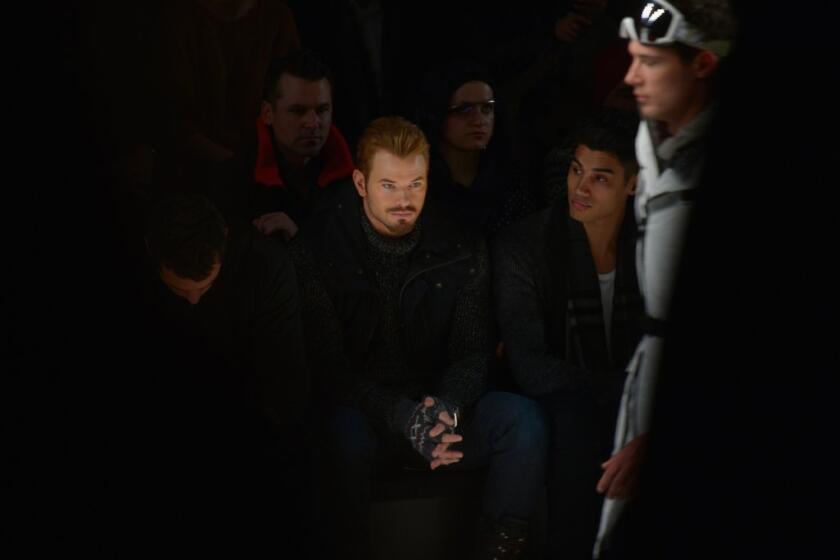 Kellan Lutz, center, shown at the recent New York Fashion Week, will wear the first eco-conscious tuxedo from the Red Carpet Green Dress challenge to the Academy Awards.