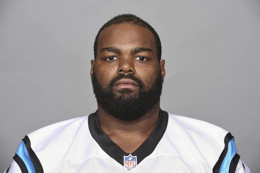 FILE - This is a photo of Michael Oher of the Carolina Panthers NFL football team. This image reflects the Carolina Panthers active roster as of Tuesday, June 20, 2017. A Tennessee judge said Friday, Sept. 29, 2023, that she is ending a conservatorship agreement between former NFL player Oher and a Memphis couple who took him in when he was in high school. (AP Photo, File)
