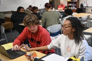 PIKE ROAD, AL - MARCH 13: Students Zeph Key, left, and Arica Haywood work on homework in study hall March 13, 2023, at Pike Road High School in Pike Road, Alabama. (Photo by Julie Bennett for The Washington Post via Getty Images).