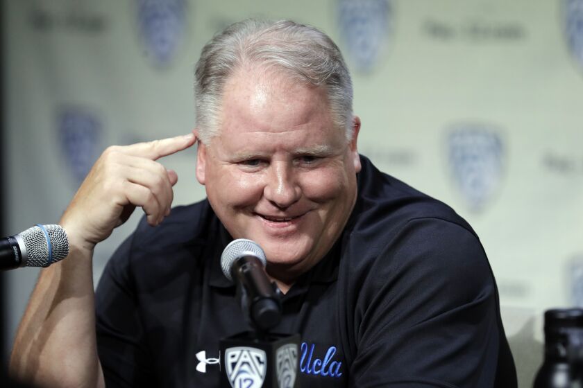 UCLA head coach Chip Kelly answers questions during the Pac-12 Conference NCAA college football Media Day Wednesday, July 24, 2019, in Los Angeles. (AP Photo/Marcio Jose Sanchez)