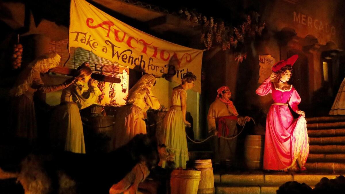 Women are sold for auction in the Pirates of the Caribbean attraction at Disneyland on June 30, 2017.