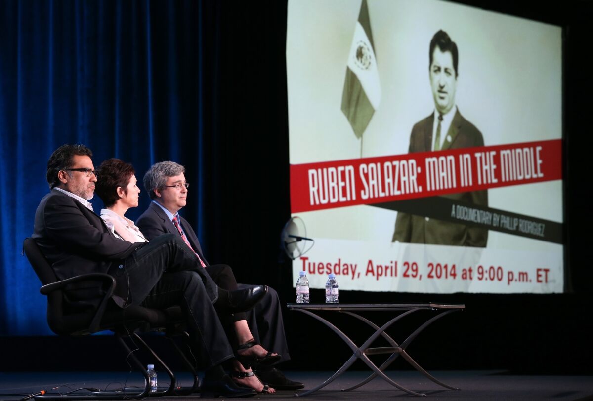 Producer and director Phillip Rodriguez, Stephanie Salazar Cook (daughter of Ruben Salazar) and Thomas Saenz, president and general counsel of the Mexican American Legal Defense and Education Fund, speak onstage during the "Ruben Salazar: Man in the Middle" panel discussion at the PBS portion of the 2014 Winter Television Critics Assn. tour.