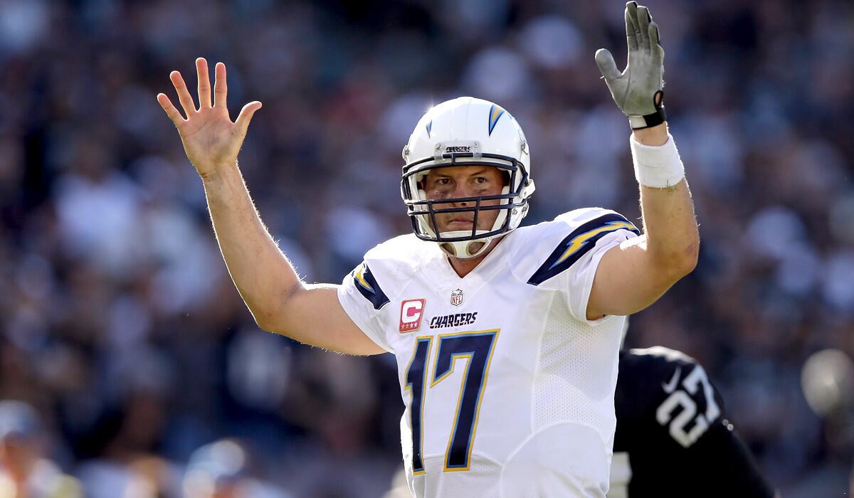 Chargers quarterback Philip Rivers after teammate Branden Oliver scored late in the game against to take the lead back from the Raiders on Sunday in Oakland.