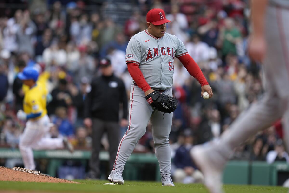 Angels reliever José Suarez reacts after giving up a two-run home run to Boston's Masataka Yoshida at Fenway Park.
