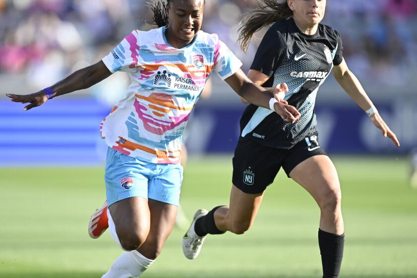 The Wave's Jaedyn Shaw fights for the ball with Gotham City's Nealy Martin during the second half of an NWSL soccer game May, 12, 2024, in San Diego, Calif. (Photo by Denis Poroy)