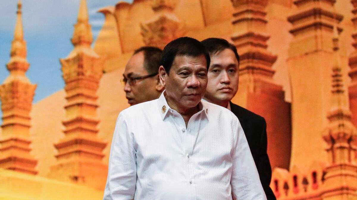 President of the Philipinnes Rodrigo Duterte arrives to the plenary session of the Association of Southeast Asian Nations (ASEAN) Summits in Vientiane, Laos on Tuesday.