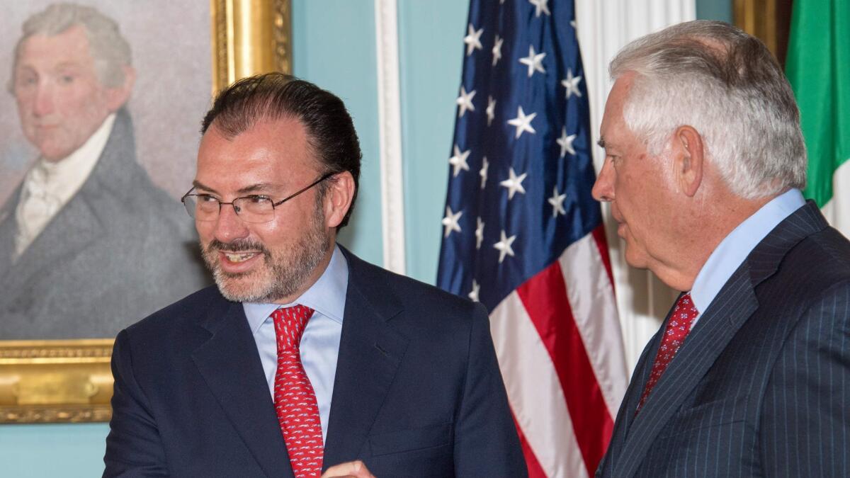 U.S. Secretary of State Rex Tillerson, right, and Mexican Foreign Secretary Luis Videgaray Caso shake hands Wednesday at the U.S Department of State in Washington.
