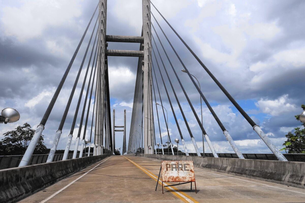 A mammoth suspension bridge in the Amazon connects Brazil and French Guiana, but remains off-limits to travelers and commuters.