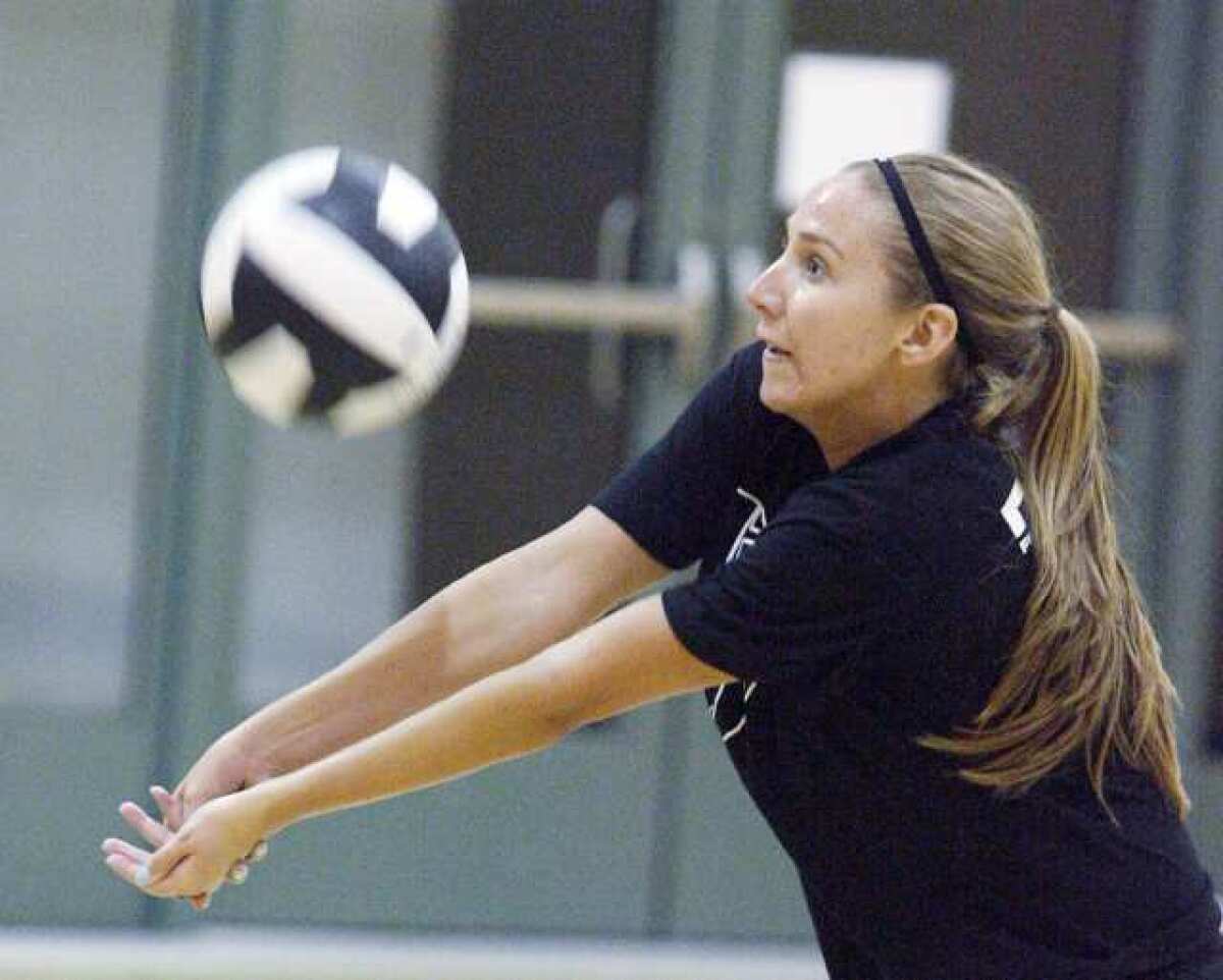 Colleen Degnan bumps the ball at a team scrimmage at Flintridge Sacred Heart Academy.