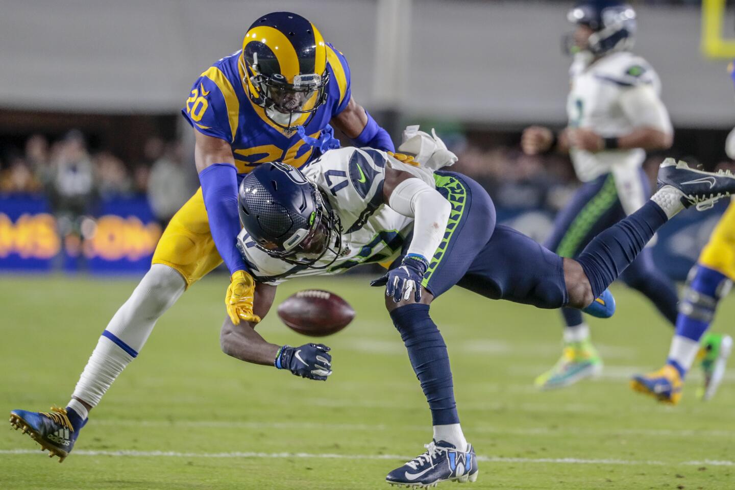 Rams cornerback Jalen Ramsey prevents Seattle Seahawks wide receiver Malik Turner from catching a pass.
