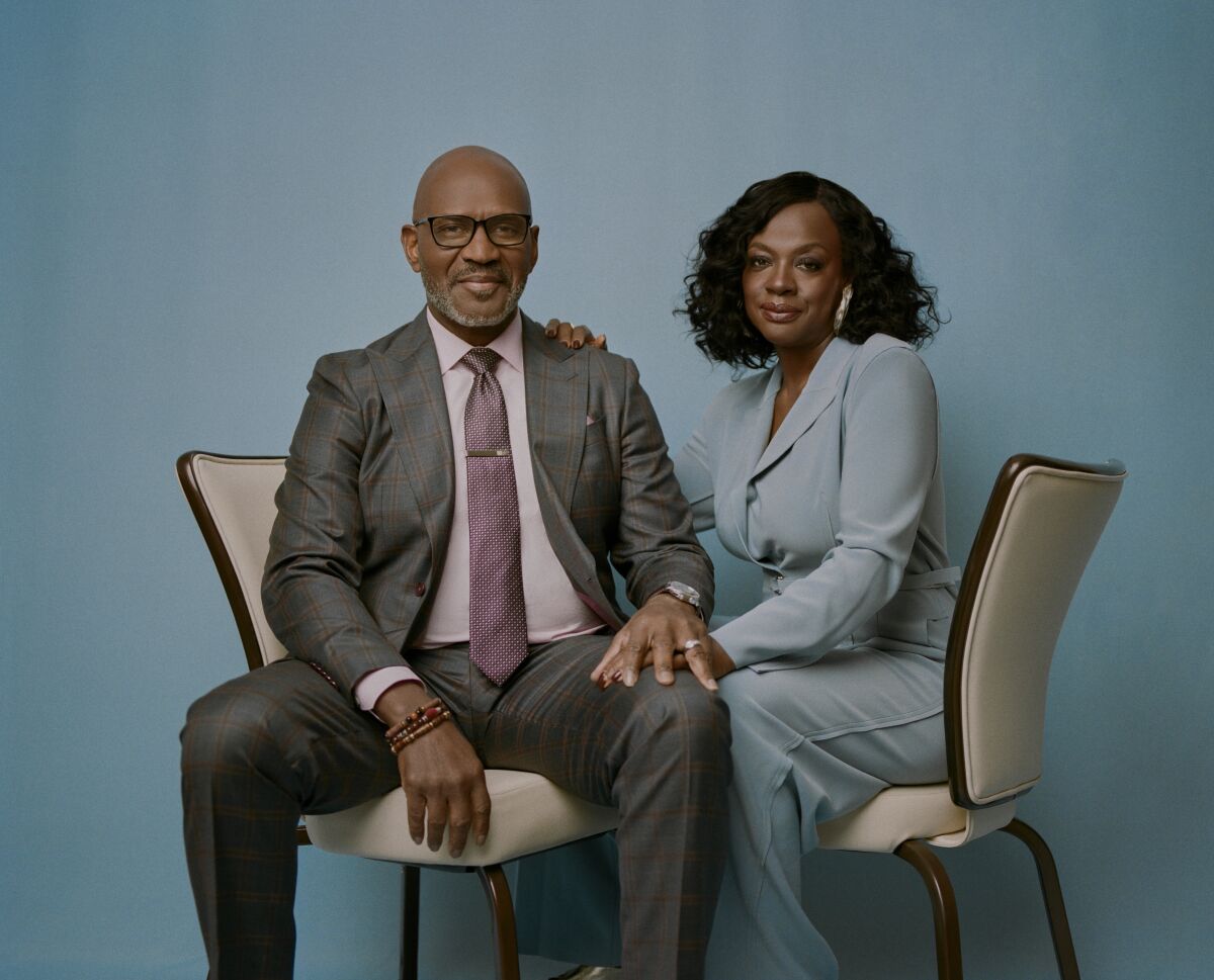Viola Davis and husband Julius Tennon sit side by side.