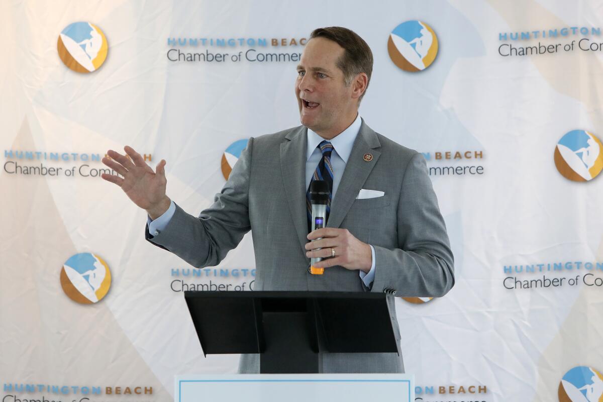 Then-Congressman Harley Rouda speaks during the State of the County at Pacific City in Huntington Beach in 2019.