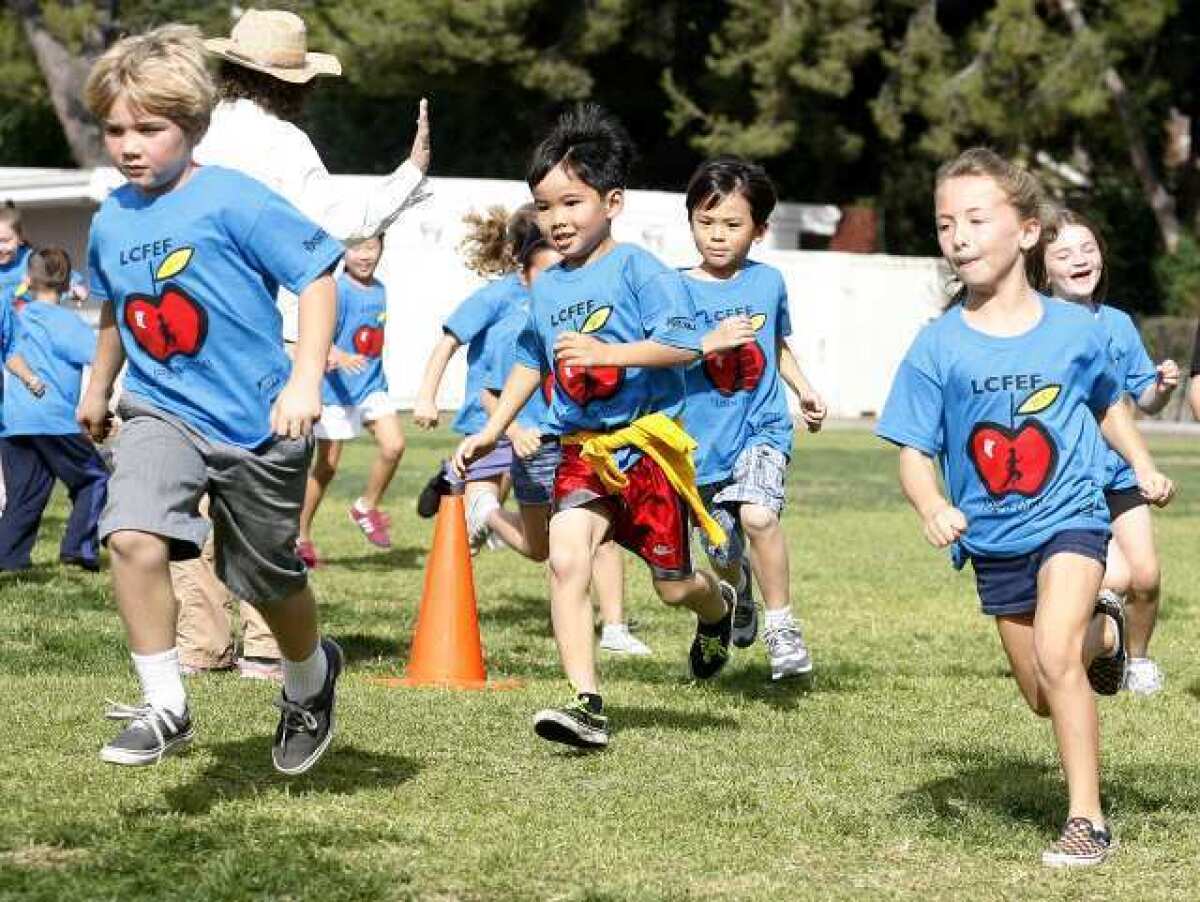 Second grade students at Paradise Canyon Elementary School head into their first lap at the 15th annual Jog-a-Thon for the La Canada Flintridge Educational Foundation on Nov. 14.