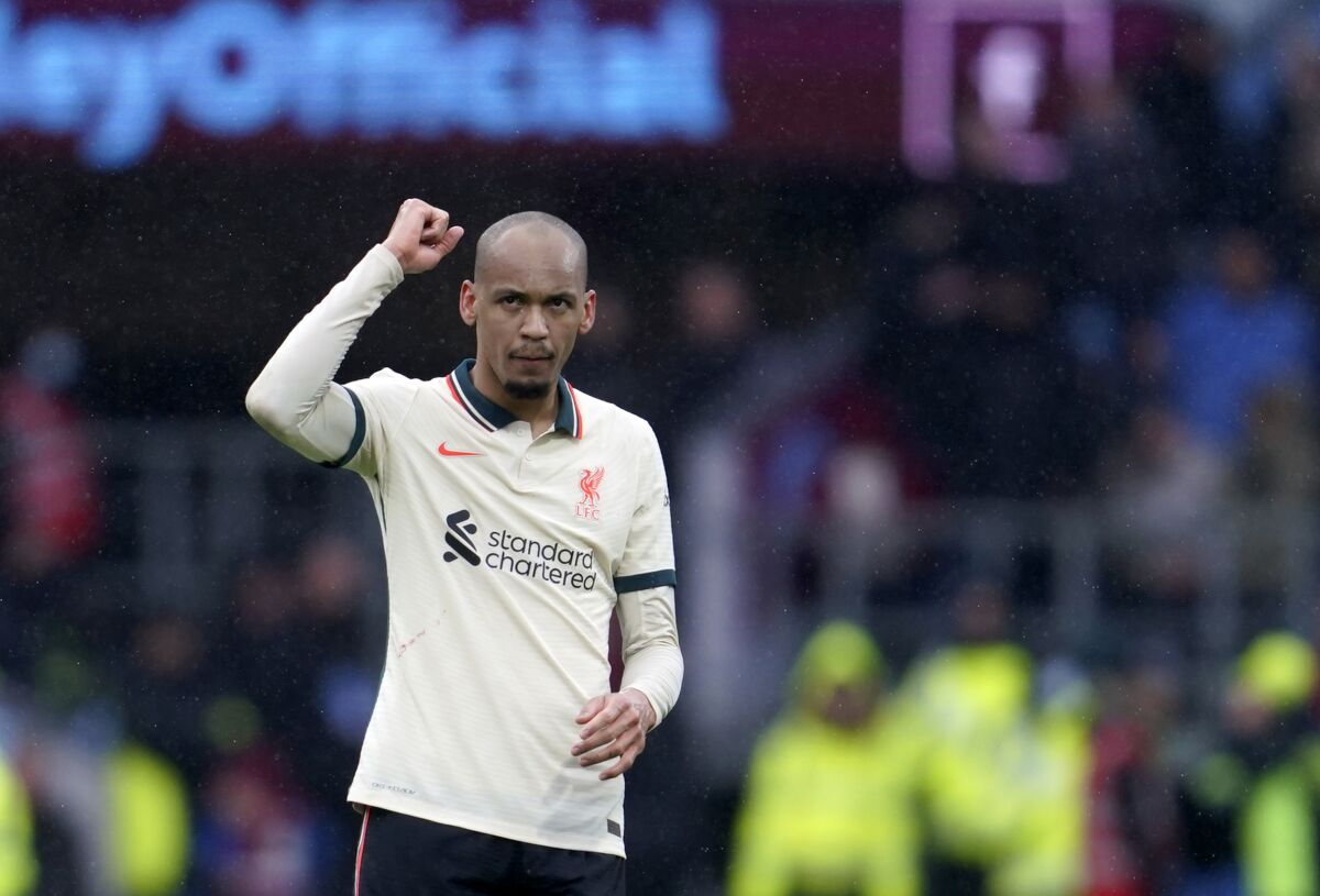 Liverpool's Fabinho celebrates after scoring his side's opening goal during the English Premier League soccer match between Burnley and Liverpool at Turf Moor, in Burnley, England, Sunday, Feb. 13, 2022. (AP Photo/Jon Super)