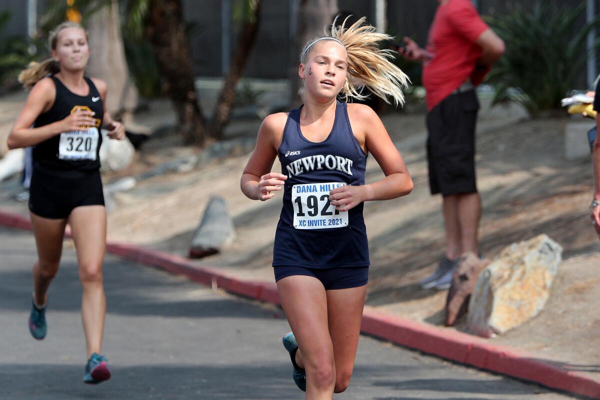 Newport Harbor's Emma Scheumann competes in the Division 2 girls' sophomore race of the Dana Hills Invitational on Saturday.