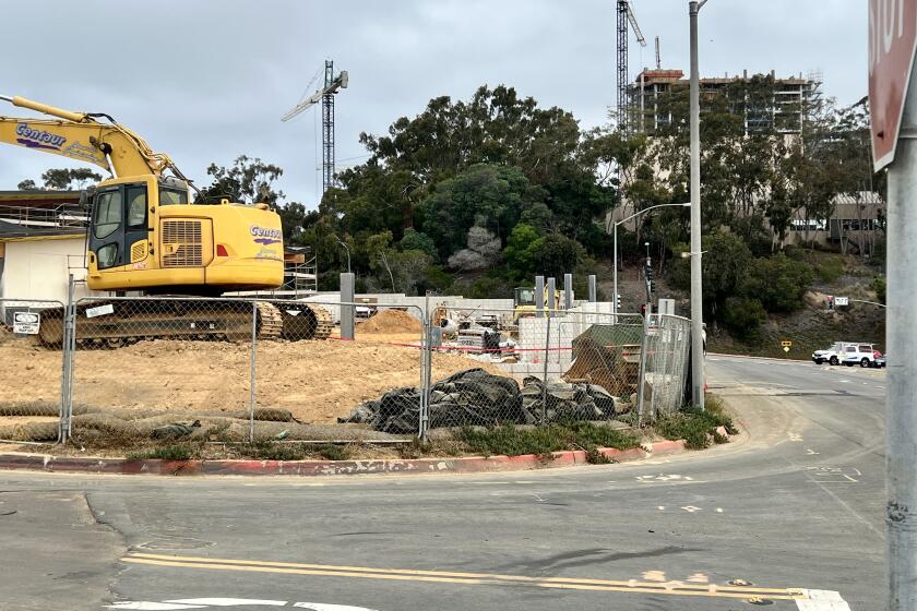 A K-rail on the east (right) side of the Hillel Center construction site along La Jolla Scenic Drive North will be installed