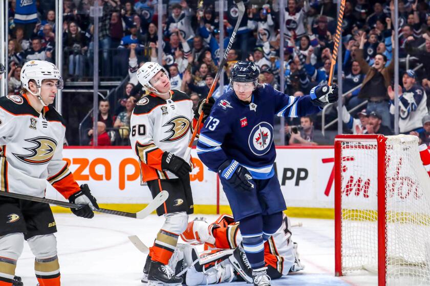 WINNIPEG, CANADA - MARCH 15: Tyler Toffoli #73 of the Winnipeg Jets celebrates his third period.