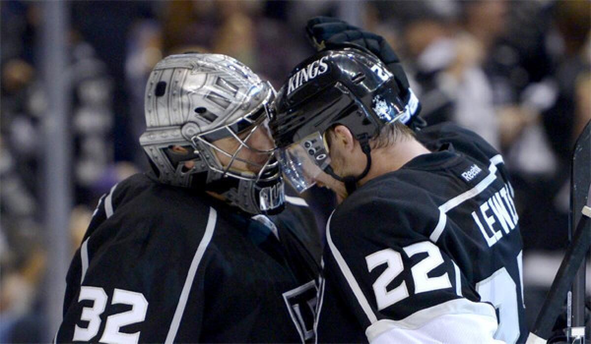 Trevor Lewis congratulates Jonathan Quick after the Kings defeated San Jose, 4-3, in Game 2 of their playoff series with the Sharks.