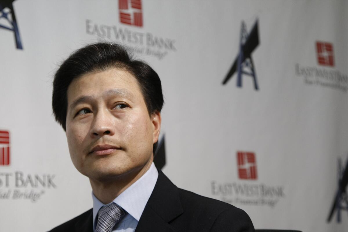 Chinese-American banking powerhouses East West Bancorp and Cathay General Corp. reported higher first quarter earnings. Above, East West Chief Executive Dominic Ng.