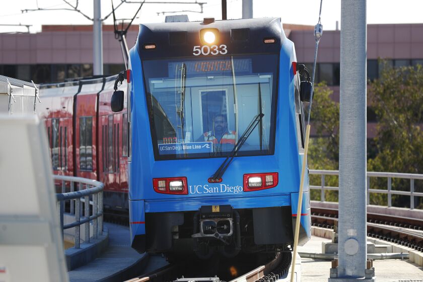 SAN DIEGO, CA - NOVEMBER 21: The Mid-Coast Extension of the UC San Diego Blue Line Trolley runs though UC San Diego, which had a grand opening celebration on Sunday, Nov. 21, 2021 in San Diego, CA. (K.C. Alfred / The San Diego Union-Tribune)