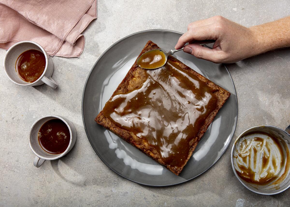 A buttery brown sugar glaze completes this crisp-edged apple cake.