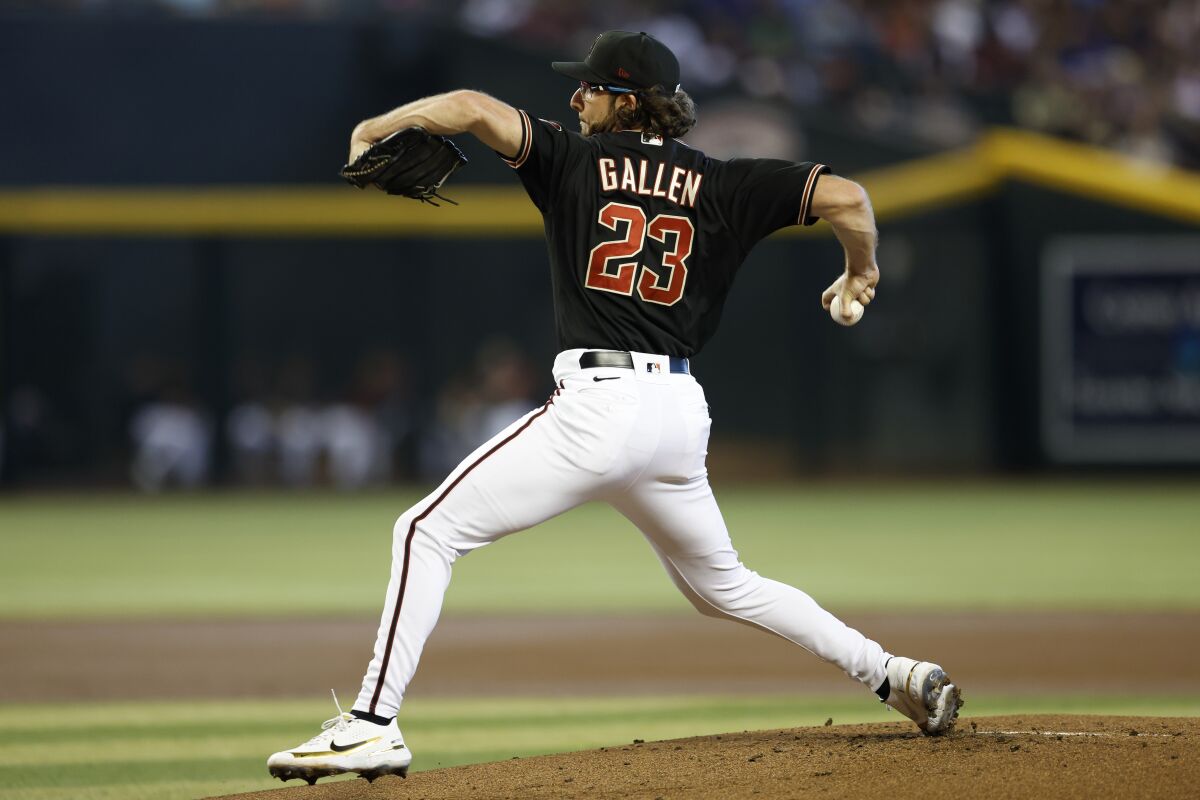 Arizona Diamondbacks pitcher Zac Gallen throws during the first inning of the team's baseball game against the Chicago Cubs on Saturday, May 14, 2022, in Phoenix. (AP Photo/Chris Coduto)