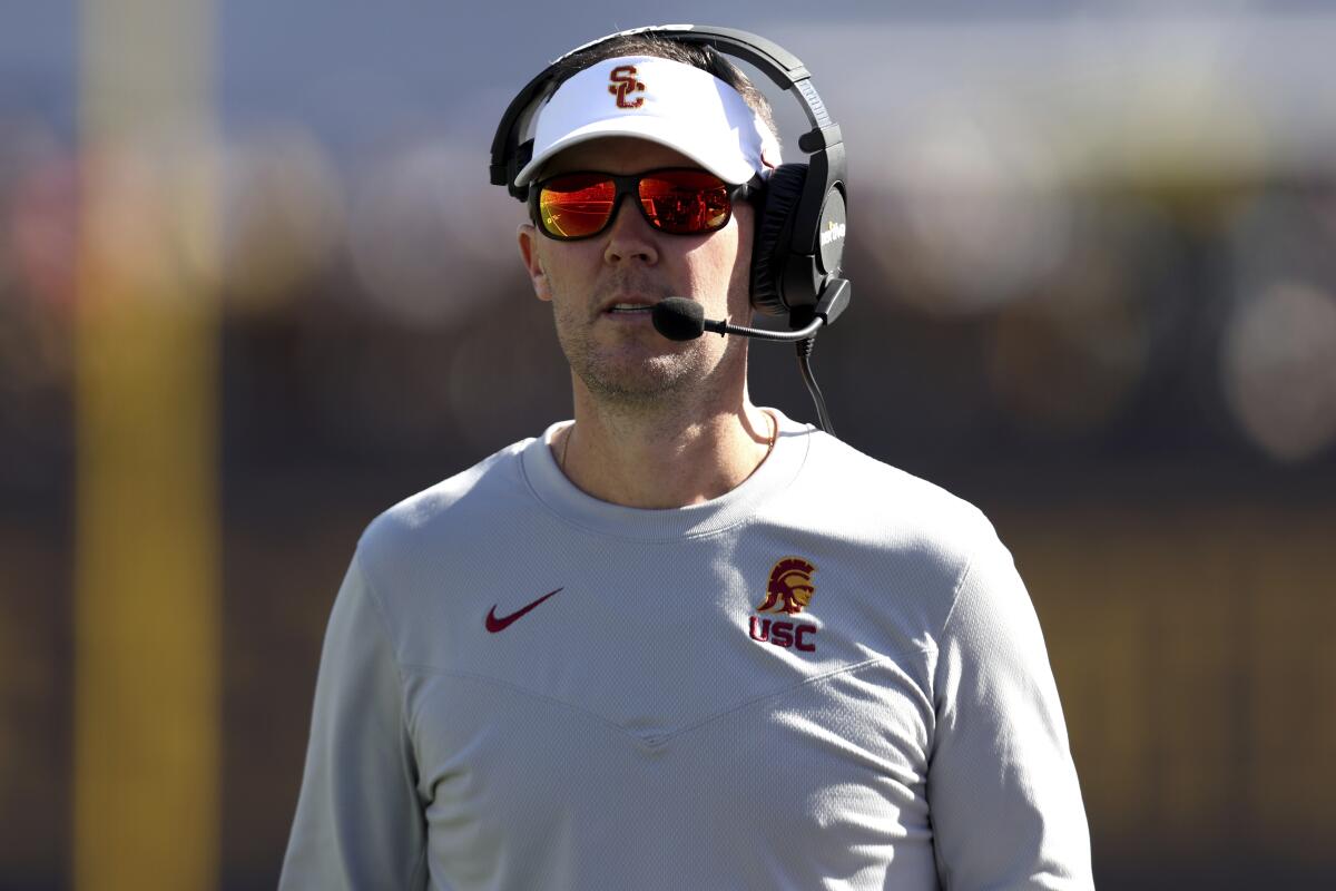 USC coach Lincoln Riley stands on the sideline during Saturday's win over Cal.
