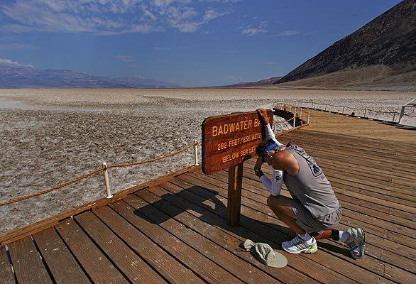 John Radich of Monrovia takes a moment before the start of the annual Badwater Ultramarathon in Death Valley National Park, the lowest point in the Western Hemisphere, on Monday. The staggered start of the race began at 6 a.m., at which time the Weather Channel recorded a brisk 94 degrees, according to the races website. The finish line, more than five marathons from the start, is at the Mt. Whitney Portals, trailhead to the highest point in the contiguous United States.