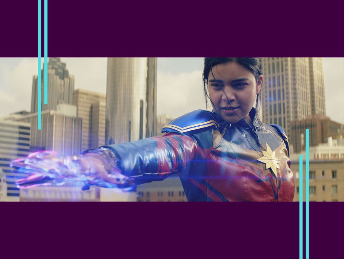 A teenage girl in a superhero costume emitting a purple force field