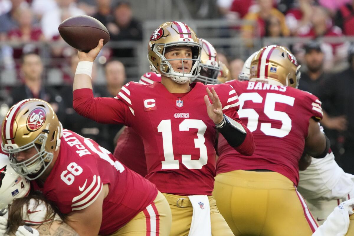 San Francisco 49ers quarterback Brock Purdy (13) throws the ball against the Arizona Cardinals.