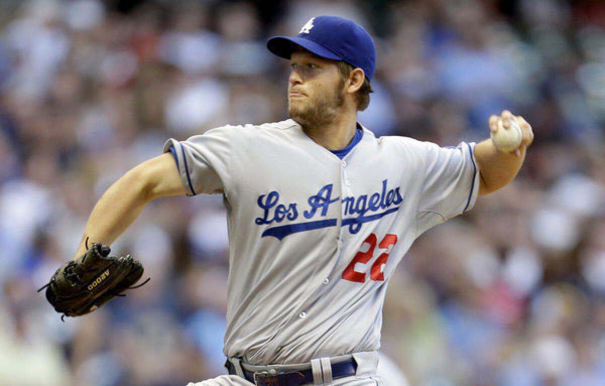 Dodgers' Clayton Kershaw pitches in the bottom of the first inning against the Milwaukee Brewers.