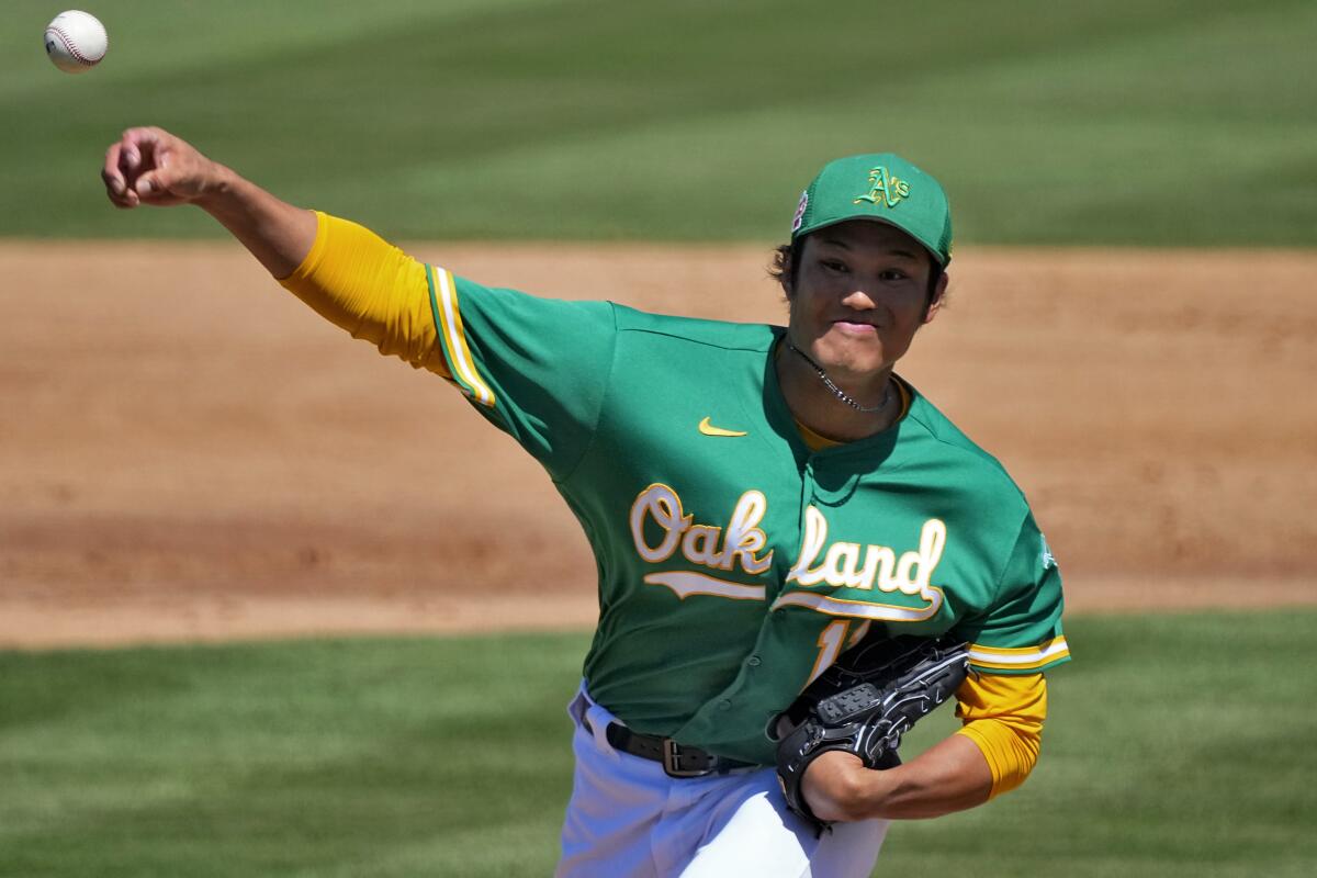 Oakland Athletics starting pitcher Shintaro Fujinami delivers during a spring game March 25. 