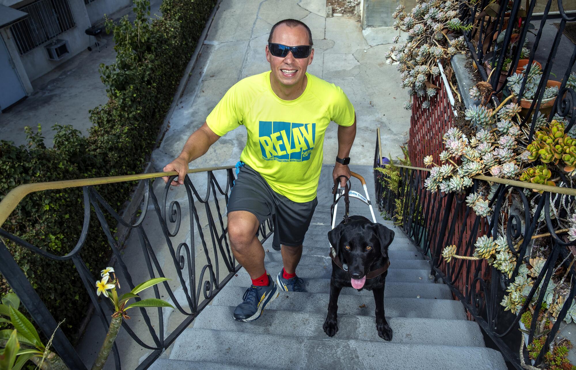 Tony Duenas and his guide dog, Diana.