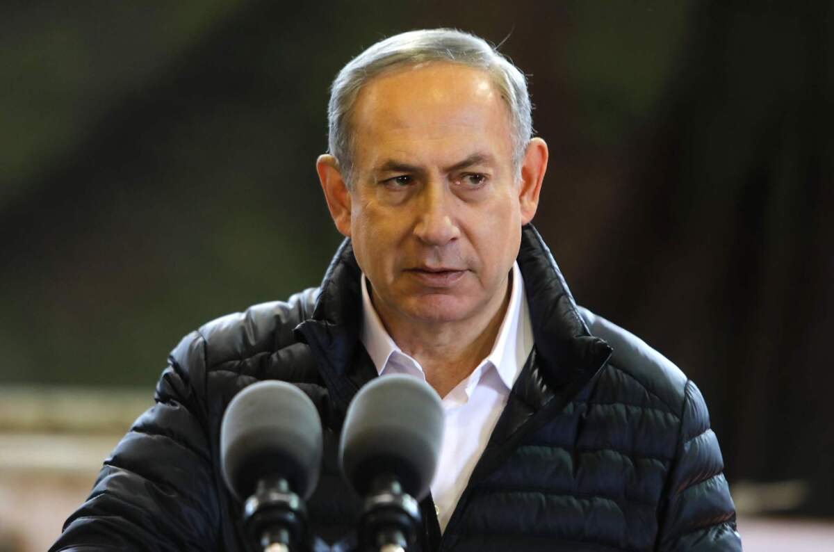 Israeli Prime Minister Benjamin Netanyahu speaks during a news conference at the army division headquarters in the settlement of Bet El, north of Ramallah in the West Bank, on Jan. 10, 2017.