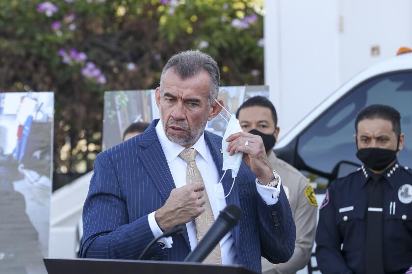 MONTEBELLO, CA - OCTOBER 14: Bill Bodner, DEA Special Agent in Charge for the Los Angeles Field Division at a news conference held to announce the largest domestic seizure of methamphetamine in the division's history. According to DEA the seizure of controlled substances, 2,224 pounds of methamphetamine, 893 pounds of cocaine and 13 pounds of heroin occurred on Oct. 2 by agents who served search warrants at multiple narcotic stash houses in Moreno Valley and Perris. The operation was the result of an investigation into a large-scale drug-trafficking organization with ties to the Sinaloa Cartel. warehouse on Wednesday, Oct. 14, 2020 in Montebello, CA. (Irfan Khan / Los Angeles Times)