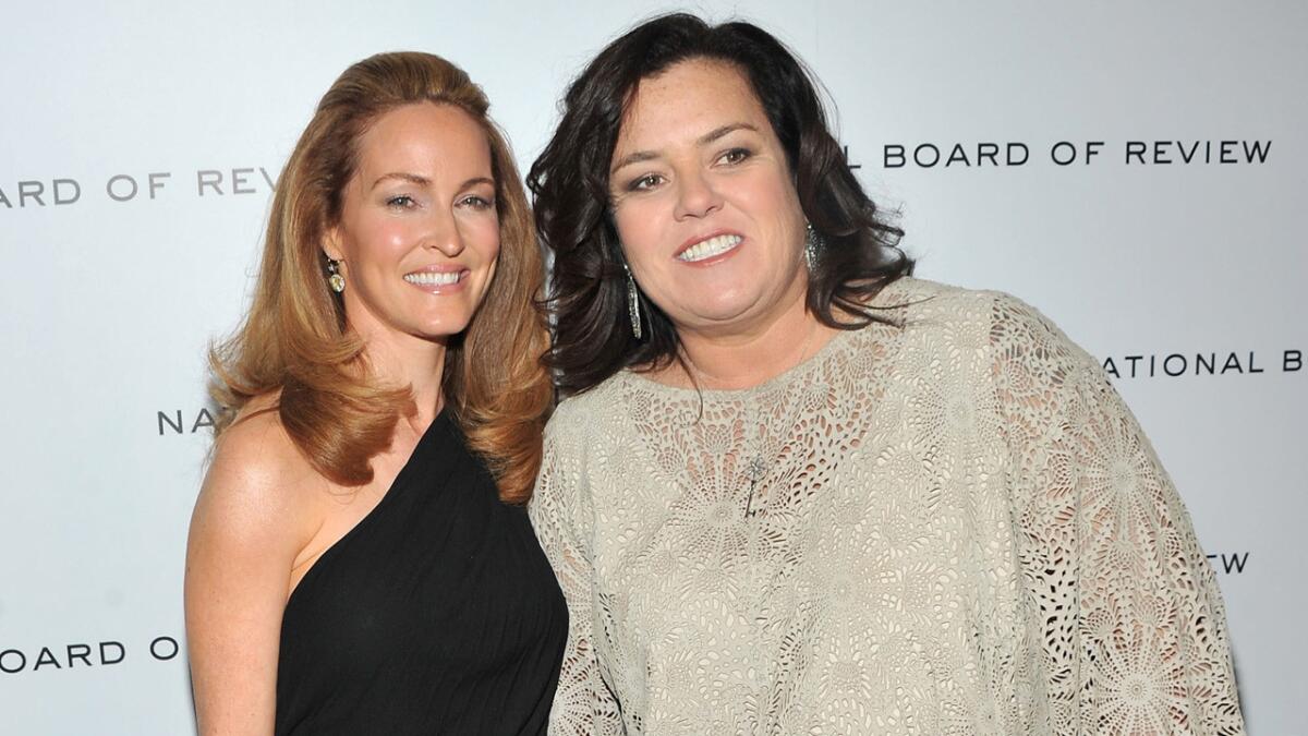 Rosie O'Donnell and her wife of two years, Michelle Rounds, left.