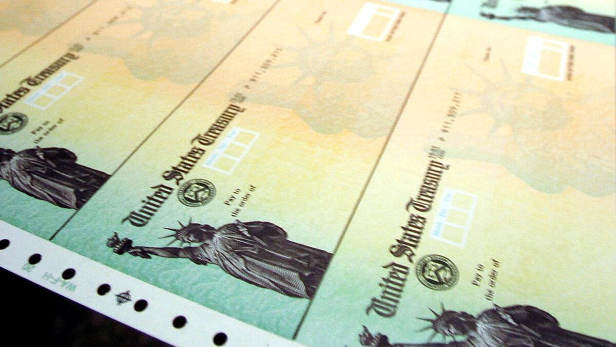 Social Security checks are shown as they are processed at the U.S. Treasury's financial management services facility in Philadelphia.