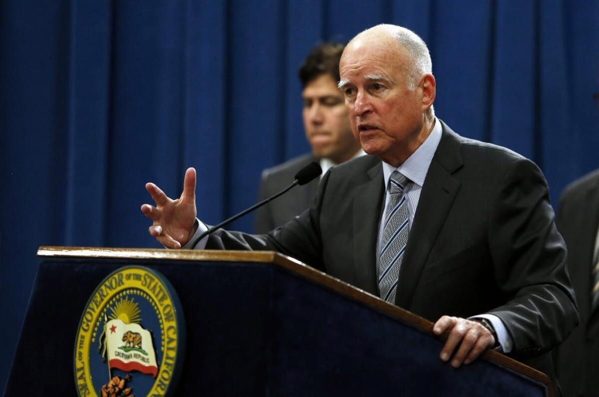 Gov. Jerry Brown addresses reporters during a news conference last month announcing emergency drought legislation in Sacramento.