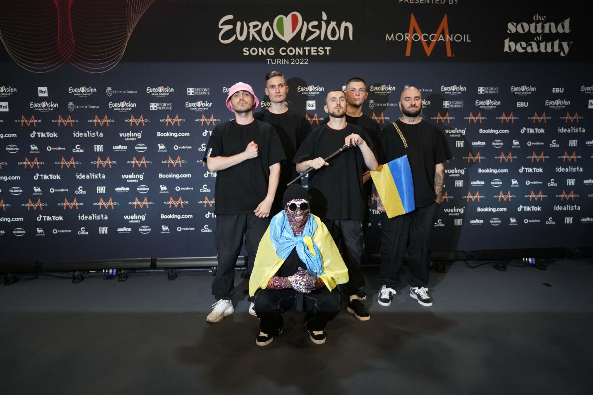 FILE - Kalush Orchestra of Ukraine pose for photographers after winning the Grand Final of the Eurovision Song Contest at Palaolimpico arena, in Turin, Italy, Sunday, May 15, 2022. The organizer of the Eurovision Song Contest said Friday, June 17, 2022, that it will start talks with the BBC on possibly holding next year's event in the U.K. after concluding that it can't be held in Ukraine.. (AP Photo/Luca Bruno, File)