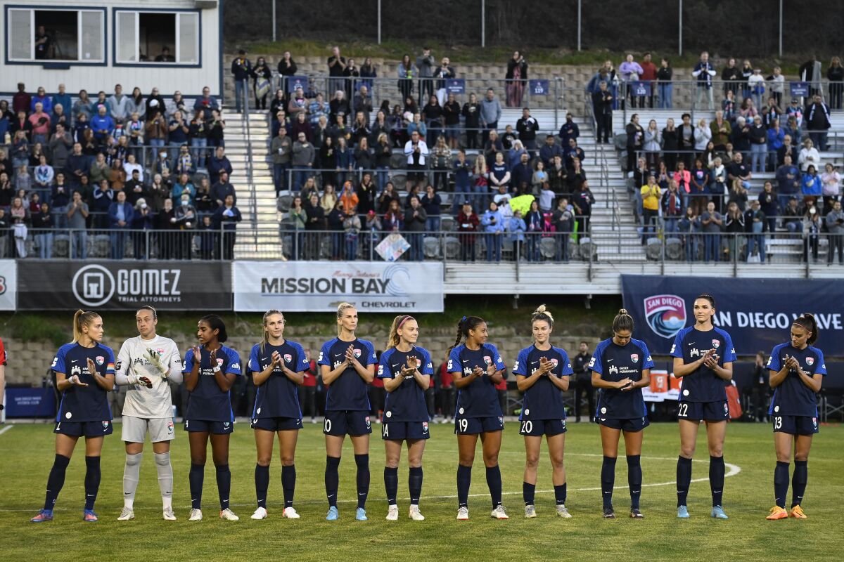 San Diego Wave players line up before game against the Portland Thorns last Saturday at Torero Stadium.
