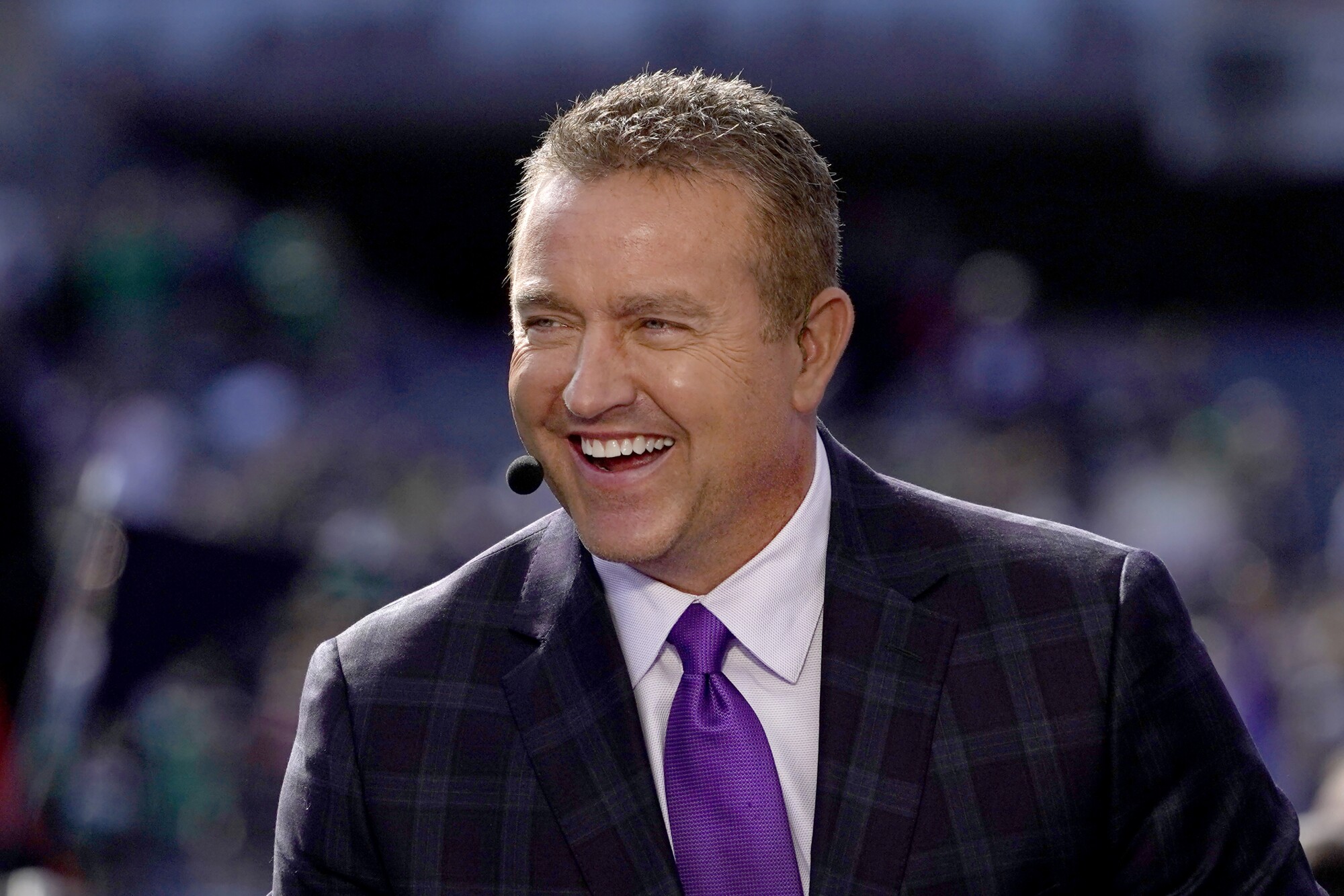 Kirk Herbstreit laughs on the set of ESPN's College Game Day