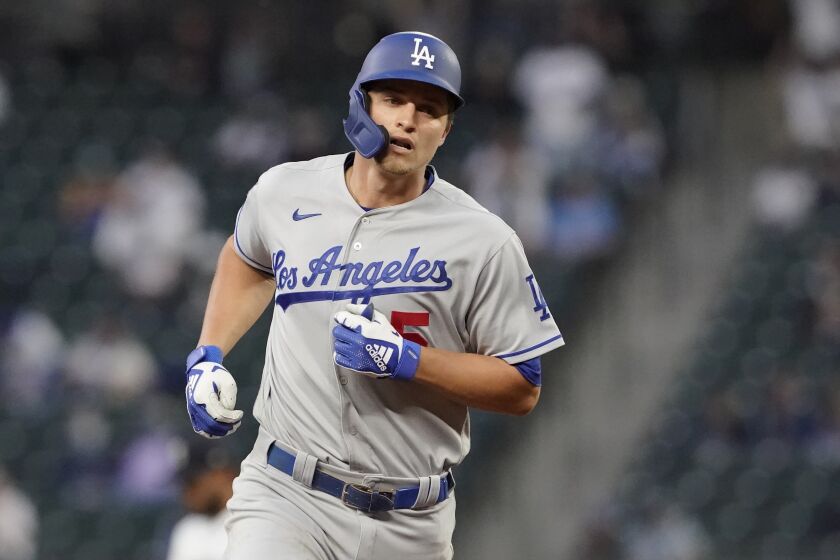 Los Angeles Dodgers' Corey Seager rounds the bases after hitting a two-run home run.