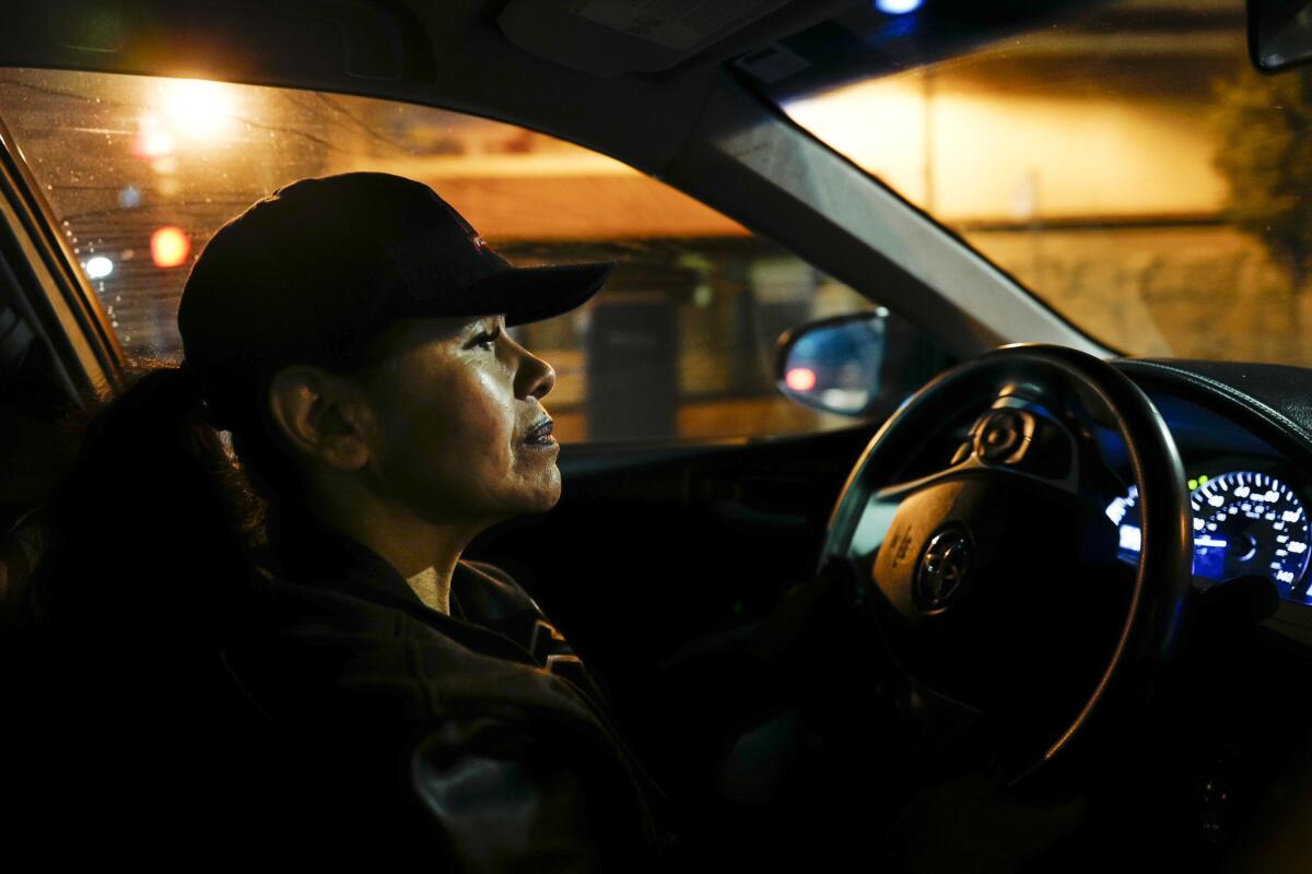 Sylvia Vigil drives down International Boulevard in Oakland, looking to help women she thinks are prostitutes.