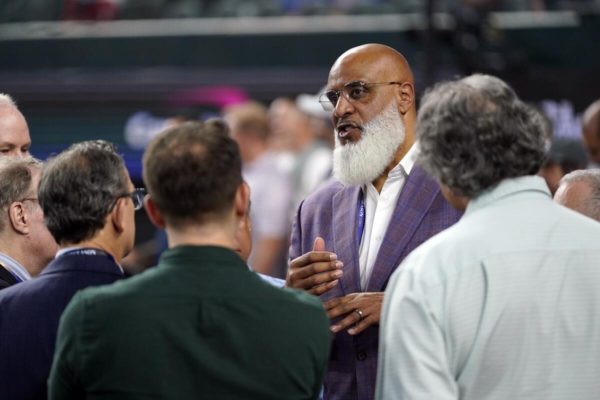 Tony Clark, executive director of the MLBPA, talks with reporters before Game 1 of the 2023 World Series.